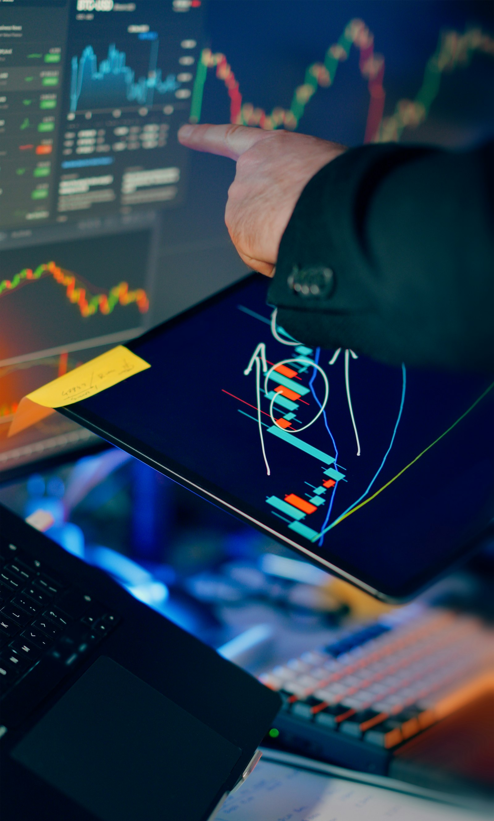 A trader analyzing crypto price charts on a tablet